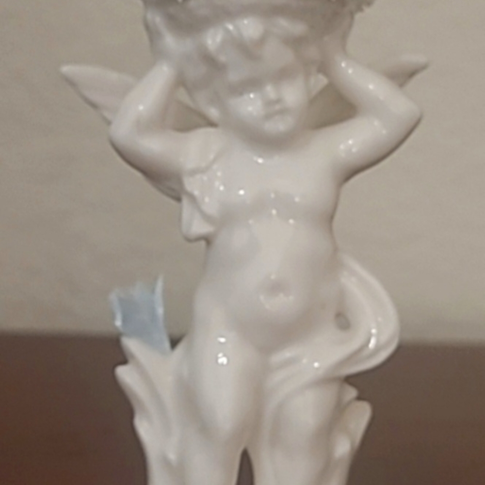 Antique White Porcelain Cherub Figurine